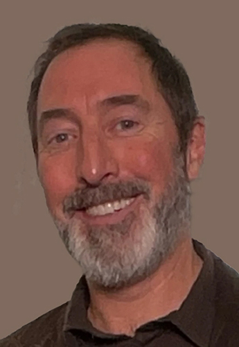 Headshot of Tim Kelly, Owner of Creative Seven